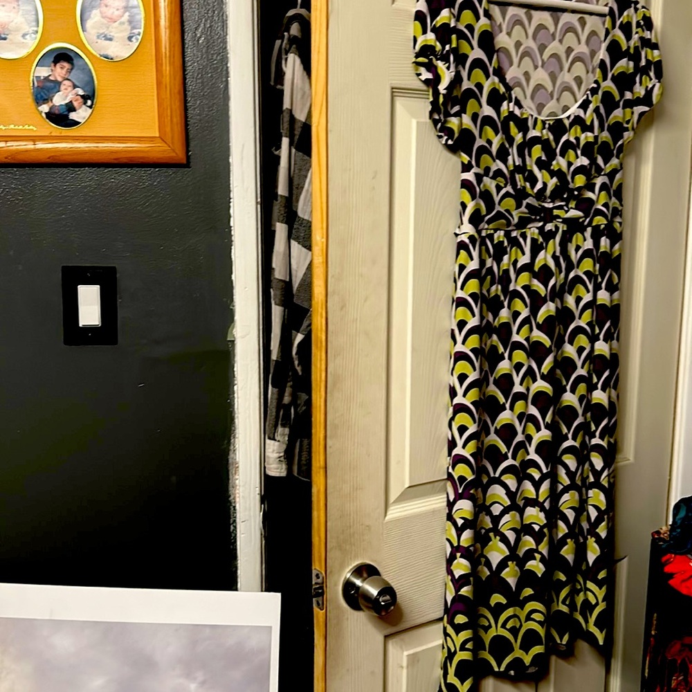 Soft and nice print. Few inches below knees. Cute with boots.